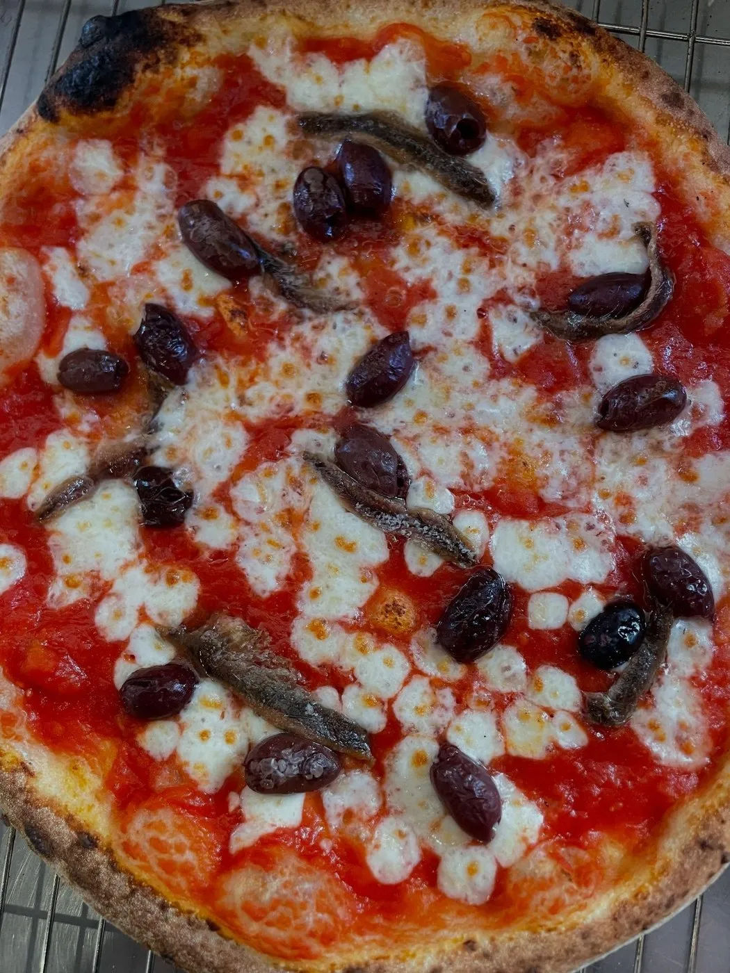A Napoli with anchovies and olives on fior di latte